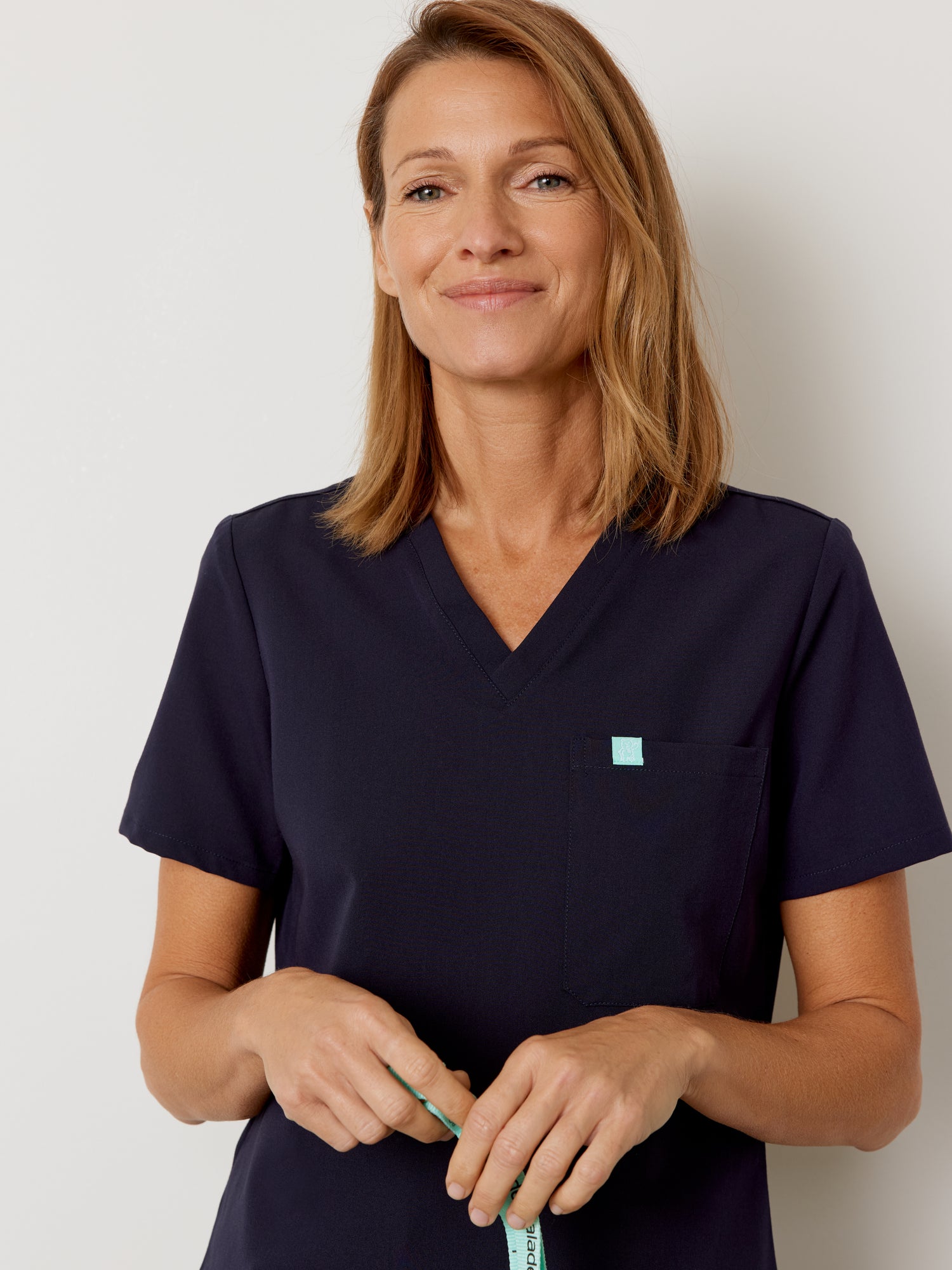 GABRIELLE RE-GARDE™ - NAVY - One Pocket Scrub Top - SILVADUR™ - Final Sale