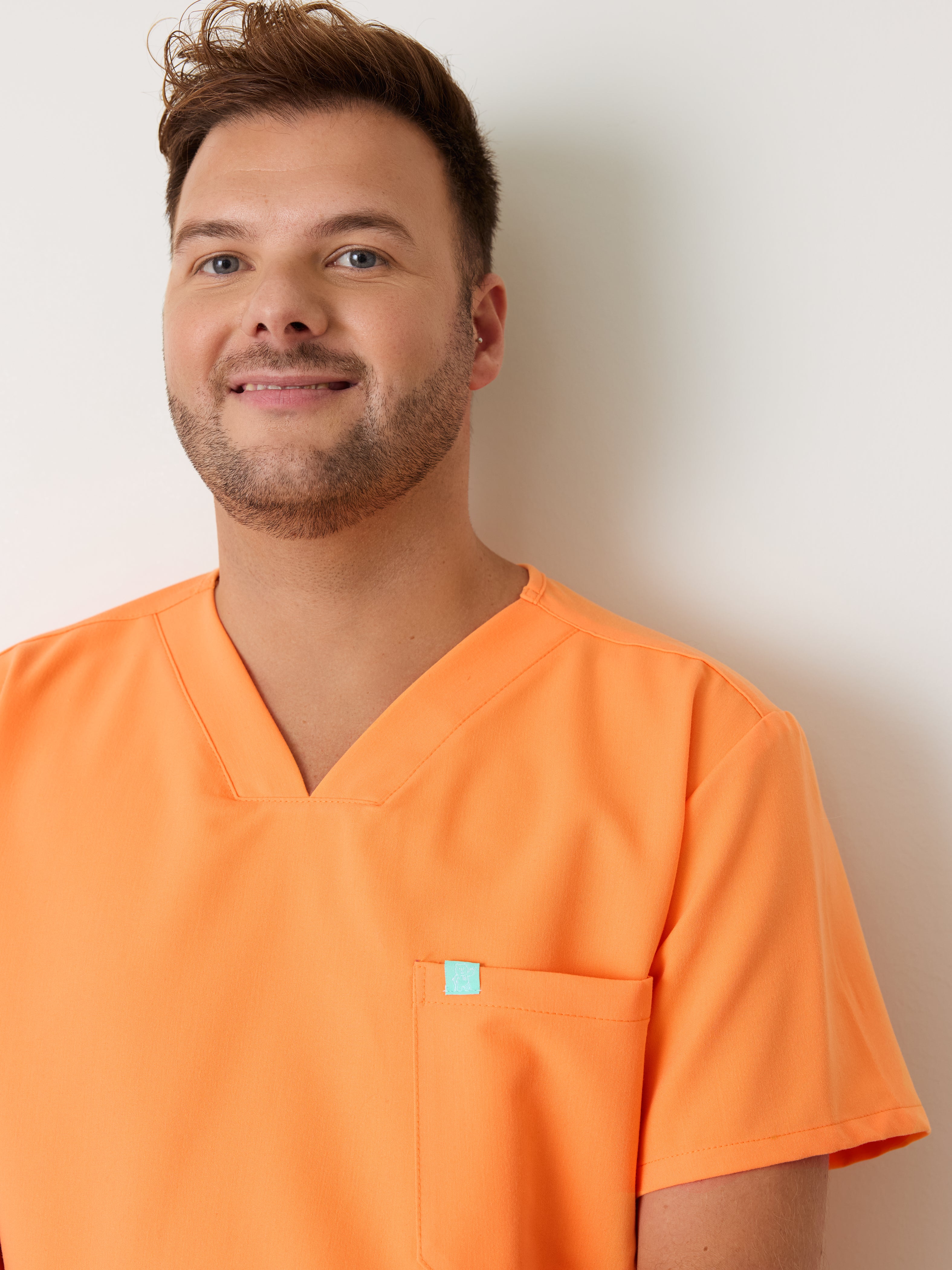 LOGAN RE-GARDE™ - NECTARINE - One Pocket Men's Scrub Top - SILVADUR™