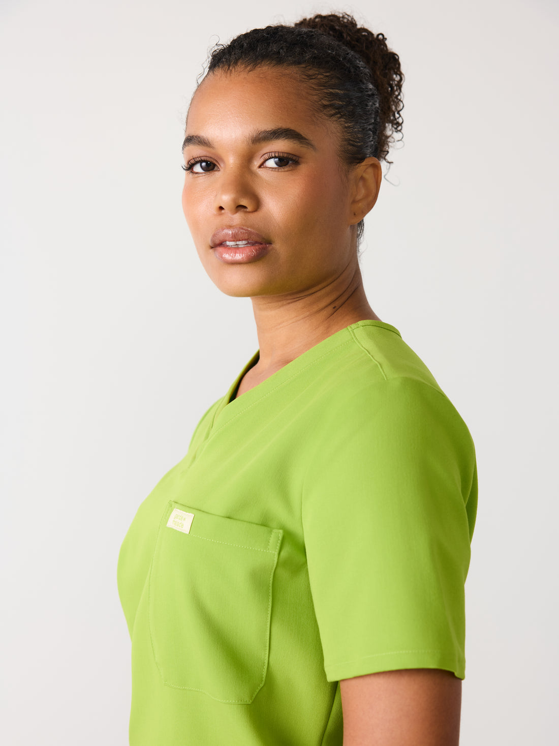 GABRIELLE RE-GARDE™ - GRUMPY GREEN - One Pocket Scrub Top - SILVADUR™