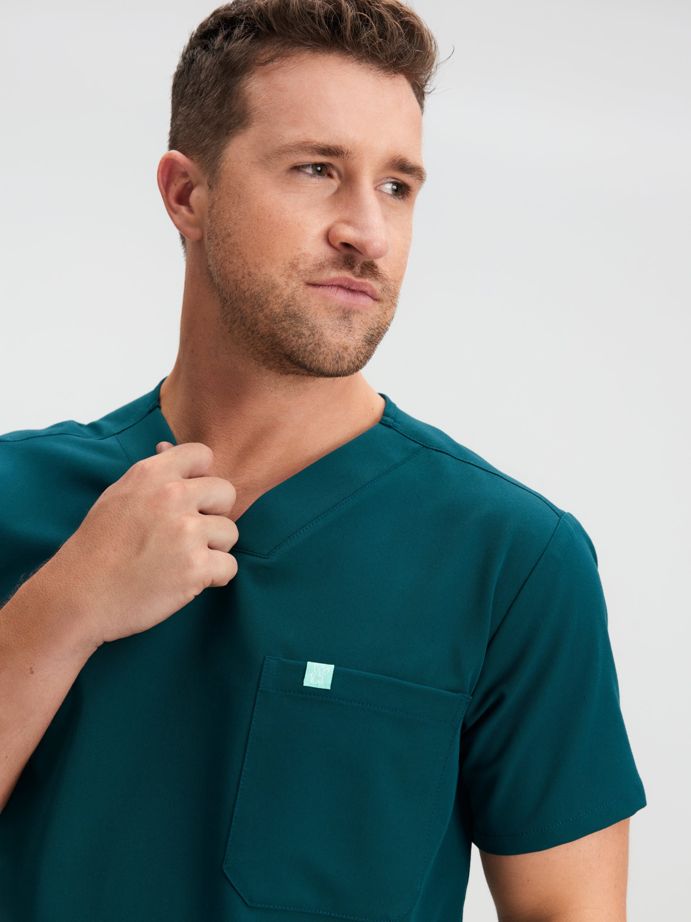 LOGAN RE-GARDE™ - TEAL - One Pocket Men's Scrub Top - SILVADUR™