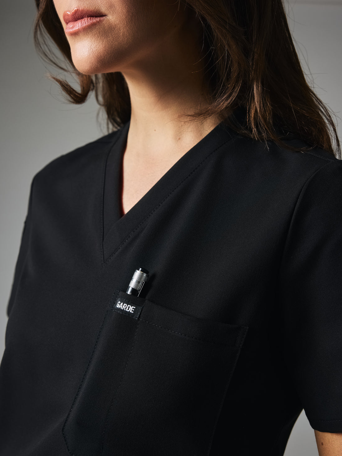 SOFIA With King Animal Hospital EMBROIDERY - BLACK - Six Pockets Scrub Top - SILVADUR™