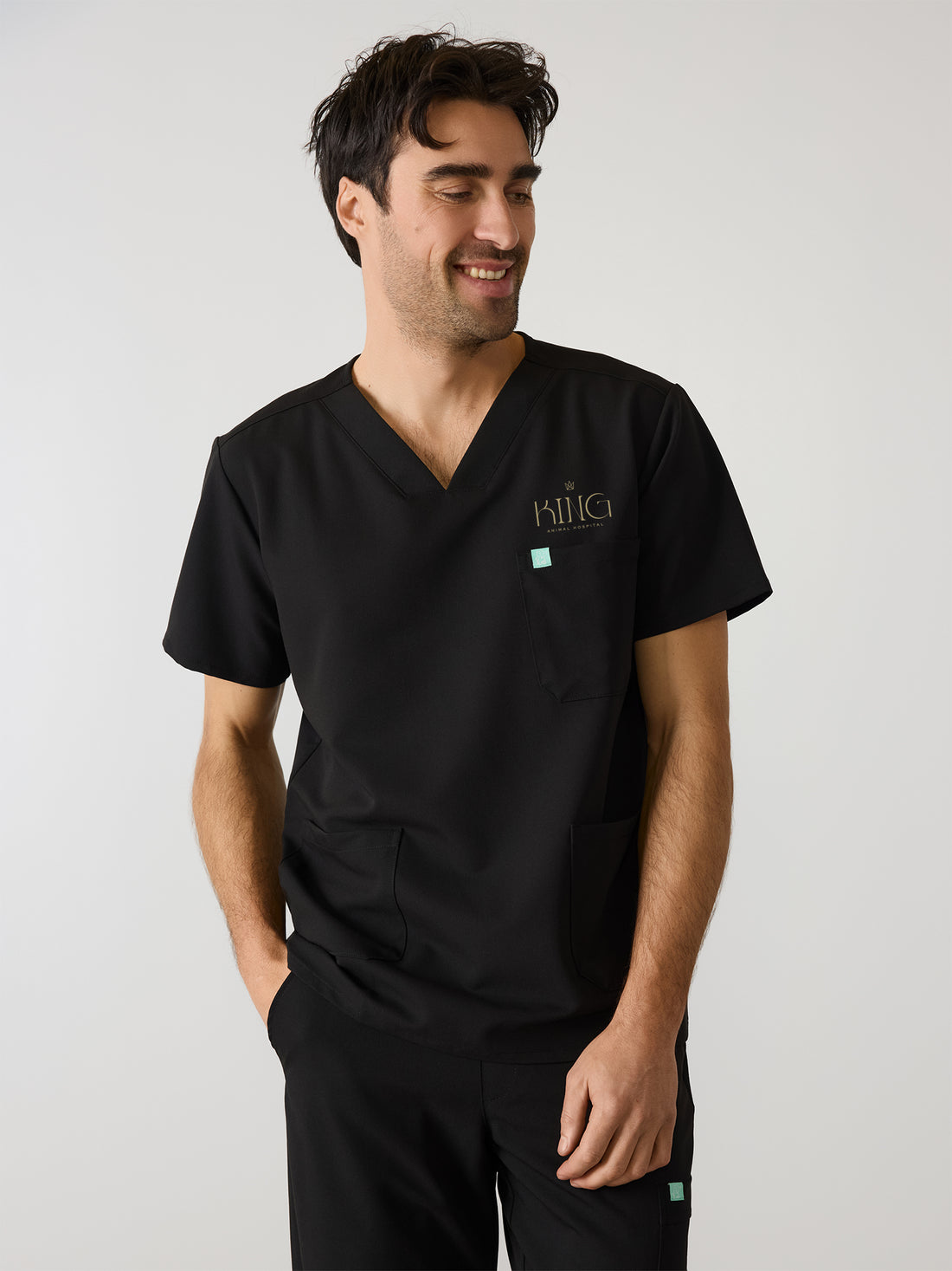 ZACK With King Animal Hospital EMBROIDERY - BLACK - Three Pockets Men's Scrub Top - SILVADUR™