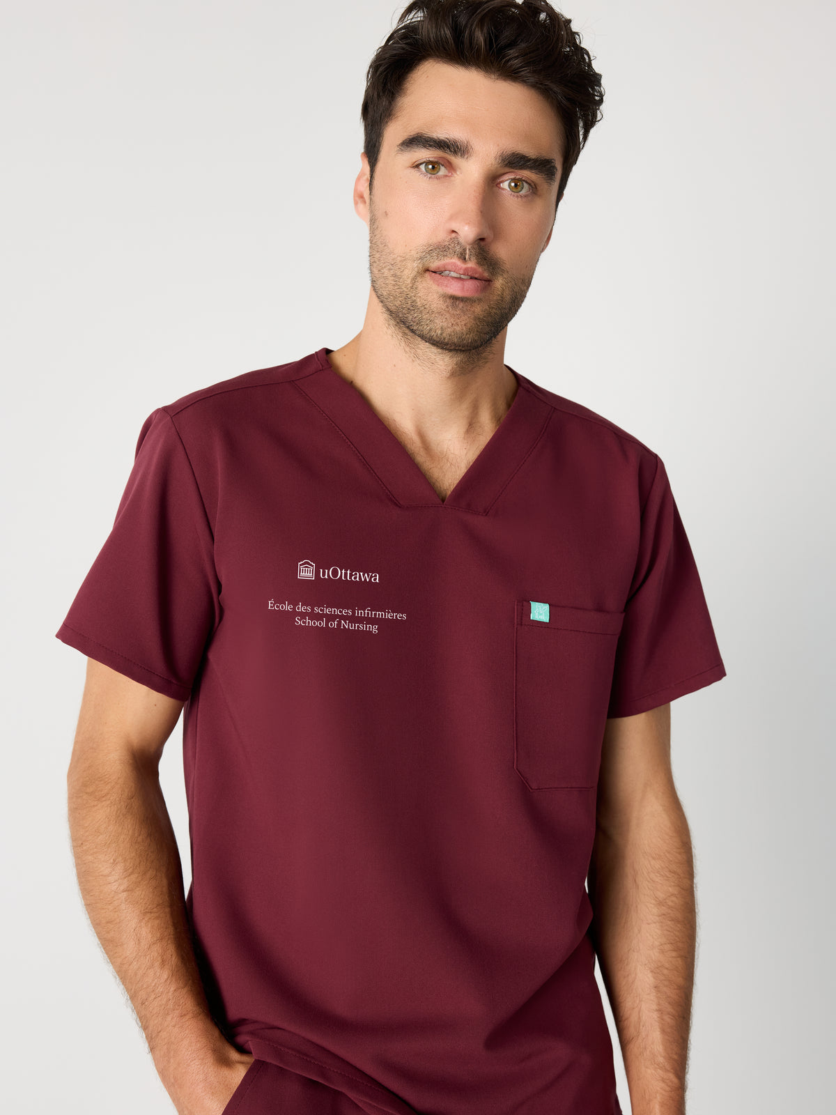LOGAN with uOttawa Embroidery - BURGUNDY - One Pocket Men's Scrub Top - SILVADUR™
