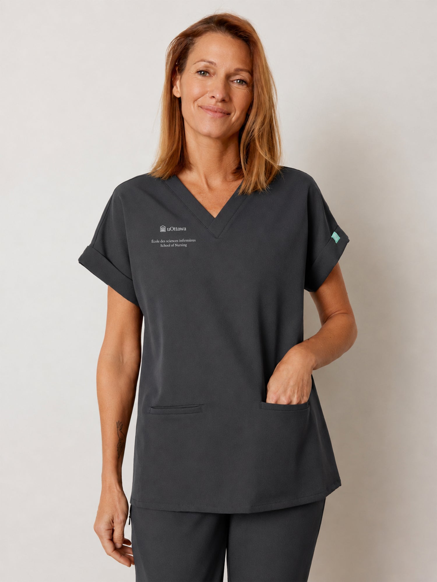 HALLI with uOttawa Embroidery - CHARCOAL - Loose Fit Scrub Top - SILVADUR™