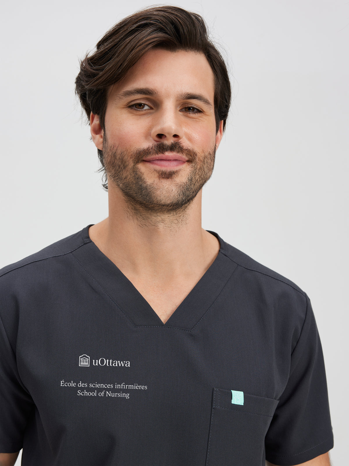 LOGAN with uOttawa Embroidery - CHARCOAL - One Pocket Men's Scrub Top - SILVADUR™